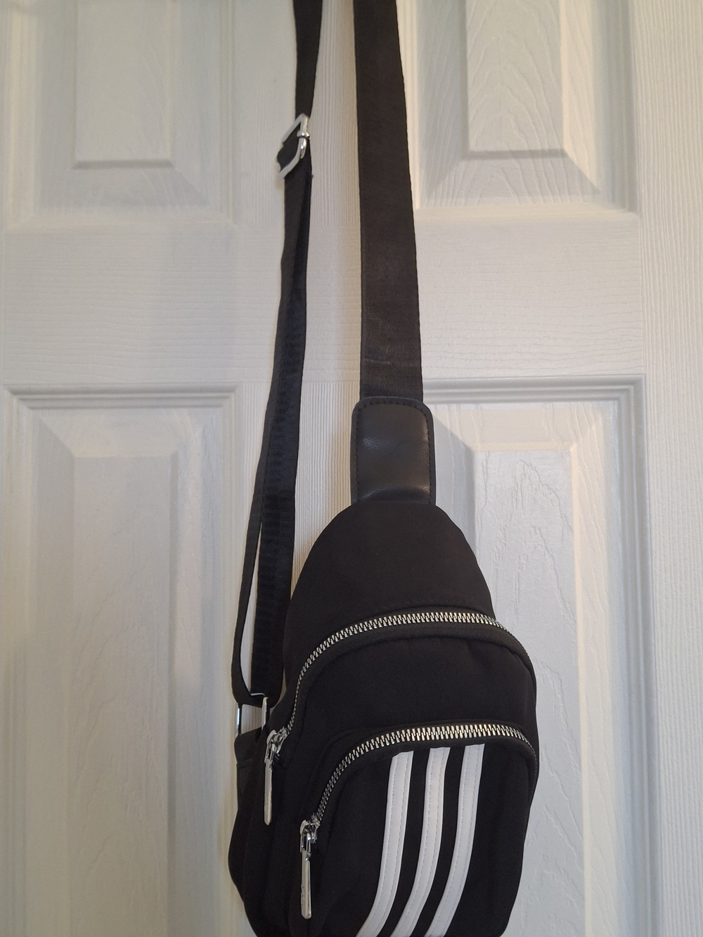 Black Crossbody Sling Bag with White Stripe Detail